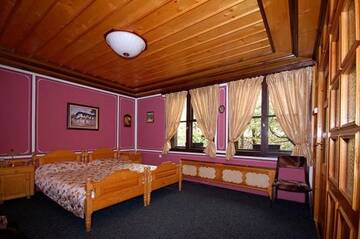Фото номера Двухместный номер с 2 отдельными кроватями Гостевой дом Encheva Guest House г. Копривштица 3