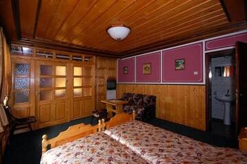 Фото номера Двухместный номер с 2 отдельными кроватями Гостевой дом Encheva Guest House г. Копривштица 4