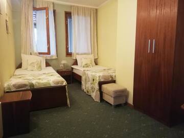 Фото номера Двухместный номер с 2 отдельными кроватями Отель Family Hotel Bashtina Kashta г. Копривштица 8